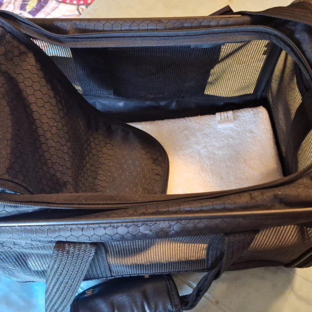 Small pet carrier.